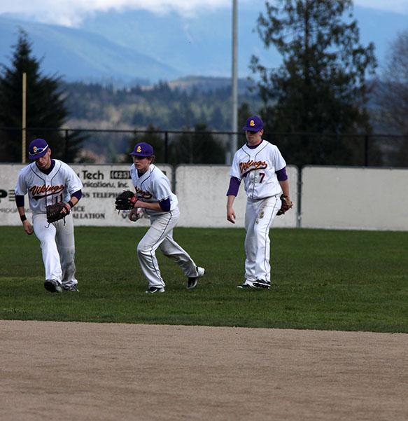Juniors+Colton+Richards+and+Quinlan+Hayes+and+senior+Easton+Funk+%28left+to+right%29+play+in+the++April+27+game+against+Cascade+High+School.+Despite+ups+and+downs+this+season+the+team+has+worked+hard+to+come+back+for+the+end+of+the+regular+season.+%E2%80%9CFrom+here+on+out%2C+I+feel+like+we+have+to+win+every+single+game+to+go+into+the+playoffs+hot+and+ready+to+go.+We+have+a+chance+to+make+it+back+to+state%2C+that%E2%80%99s+the+ultimate+goal%2C%E2%80%9D+senior+Conner+Sayles+said.