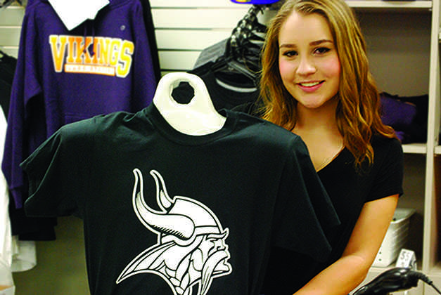 Senior Tara Mandarino holds up one of the new Cove products recently received this year. This year The Cove ordered many new products to purchase. “This year we are off to a much better start than we were last year. Last year we didn’t have as many products,” Mandarino said.
