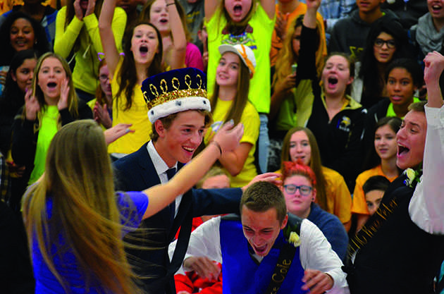 Royal Bling. The 2015 Homecoming Crown is presented to senior Jack Stevens at the “Back to the Future” themed  Homecoming Assembly. In the past, the crown was presented to a Prom King, not a Homecoming King. “It should be a school wide vote as to whether or not we should have a Prom King or a Homecoming Queen,” senior Corbin Schueller said.