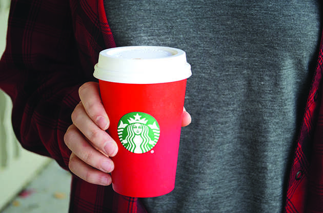 Starbucks’ new red cup design uses no snowflake adornment.  The company went with a simplistic look to let customers interpret the holidays in their own unique way.  However, some don’t favor the festive red hue and claim that Starbucks is anti-Christmas.