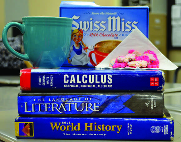 Link Crew advertises and prepares for the upcoming Cocoa, Cookies and Cram event. Both National Honor Society and Link Crew members will be running the study session and helping students. “It gives students a chance to study, but also have a good time by eating cookies and hot chocolate,” Lopez said. 