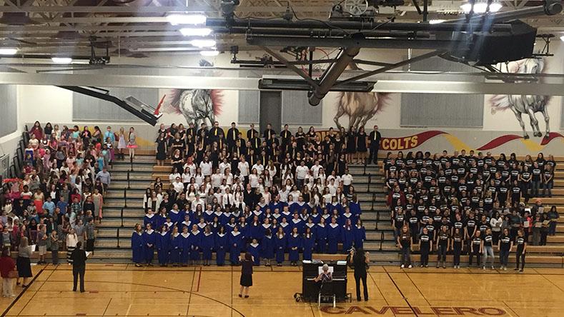 Choirs+come+together+to+sing+%E2%80%9CCelebration%E2%80%9D+as+a+final+song+for+their+audience.+%22The+All+District+Music+Festival+was+great%2C+I+love+seeing+all+of+the+choirs+working+together+to+make+a+great+show%22+said+senior+and+Concert+Choir+member+Stephanie+Wislen.+It+was+a+successful+concert+that+showed+off+the+heaps+of+musical+talent+in+the+Lake+Stevens+School+District.+
