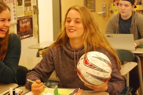 Some athletes like junior Emily Peterson, are able to balance sports with their schoool work.