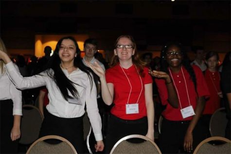 Juniors Meraiah Medellin, Savannah Pratt, and senior Destiny Otusanya are joining in the FCCLA meeting festivities by showing off their best dance movies. “My state experience was really great! I really liked the dance,” junior Savannah Pratt said. Credit to: Hahn’s photos