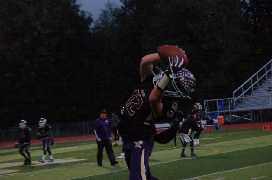 Senior Austin Murren stretches out for a catch before their homecoming match up against Cascade. The Vikings won 55-7. Murren had only one catch on the night, a 15-yard touchdown, to help the cause.