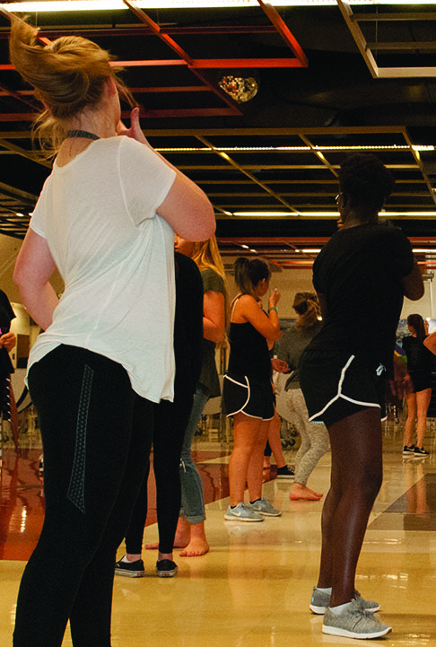 Senior+Kayla+Perkins+and+junior+Brenda+Hoist+practice+their+routine+for+the+Homecoming+Assembly+to+be+held+on+October+20%2C+2017.+All+dance+routines+have+been+choreographed+by+students%2C+the+last+two+were+choreographed+by+senior+Makenzie+Heggie.+%E2%80%9CWe+are+all+pretty+confident+about+the+new+dance+routine+and+excited+to+perform+at+the+assembly%2C%E2%80%9D+says+Olivia+Quattrin.%0A%0A