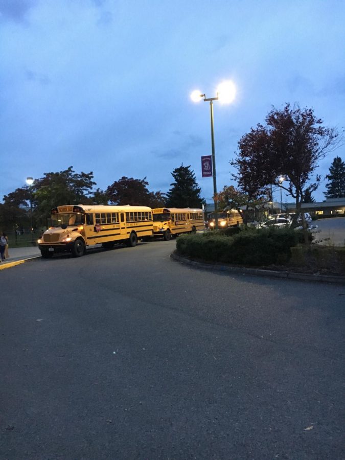 Rise and no shine: Around the time of the first bell going off, kids get 
off the bus and head into the school. Students had to get up early to 
get to school in time to make the first bell, at 7:30. “It’s too early 
definitely and seems unfair other schools start later,” Plank said.
