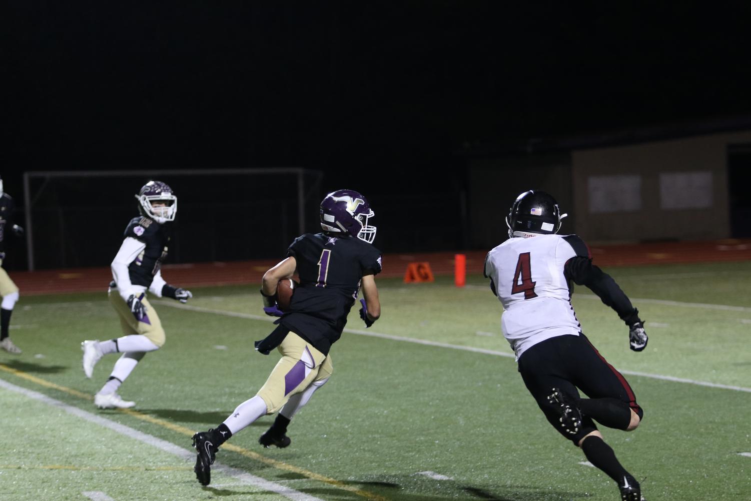 Junior Ian Hanson guns it for the end zone after making a catch in the first quarter. Lake Stevens won 51-0. The Vikings will play the Graham-Kapowsin Eagles next week at Lake Stevens High School.