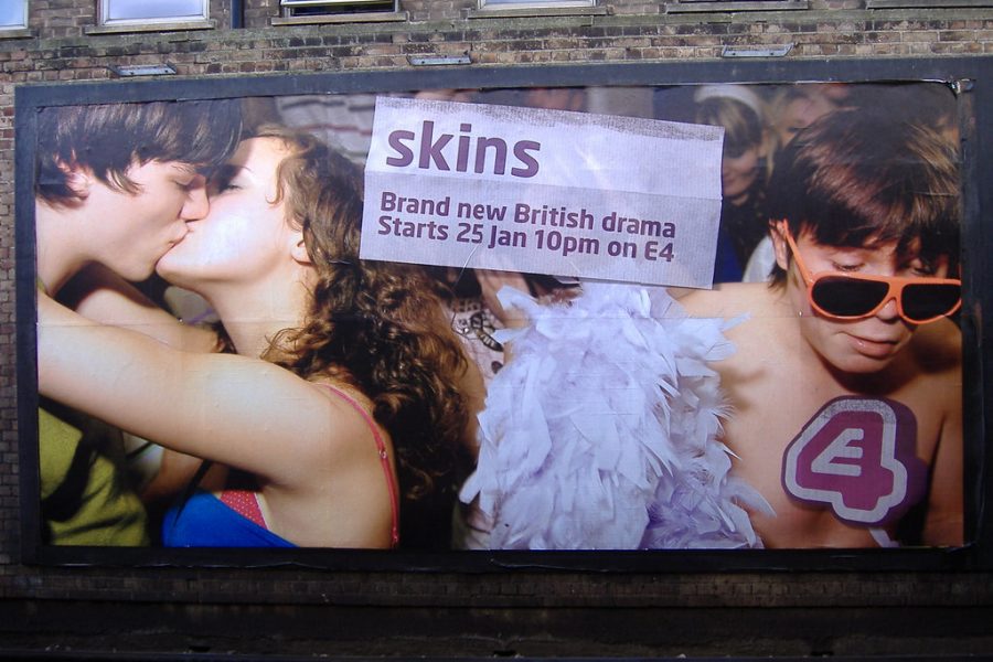 Real-life through television? 
Here we have the billboard for the premiere of the British show Skins, from left to right is Tony (Nicholas Hoult),  Michelle (April Pearson), and Chris (Joe Dempsie.) Skins later went on for another 7 seasons. Its an extremely dramatic show, theres a lot happening all at once, senior Abby Doleshel said.