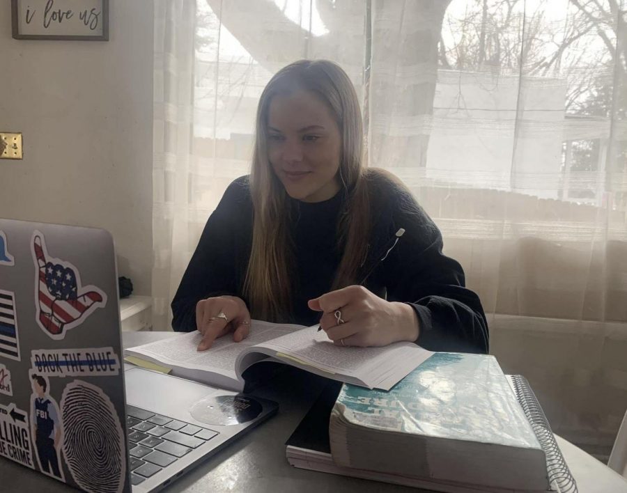 Study Time: Raye Liffrig studies criminal psychology in her college apartment in Pullman, Washington. Due to COVID-19 she was not able to attend classes on campus,; however, she continues to keep a positive attitude.