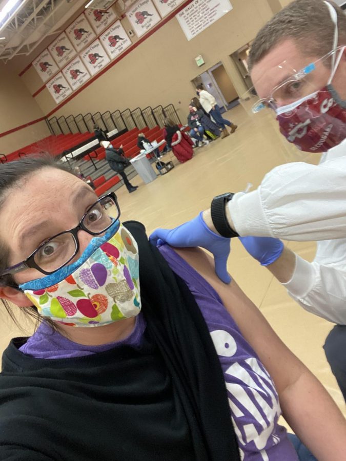 Staff Warrior: LSHS Staff member Megan Britton receives her first dose of the novel coronavirus vaccine inside the Snohomish High School gym. LSSD and Kusler’s Compounding Pharmacy partnered to set up a vaccination site to vaccinate teachers and paras. “They were very quick, clean, efficient and kind. I got an email reminder about a week ahead of time to schedule my second shot with them and the process was just as smooth,” Britton said.