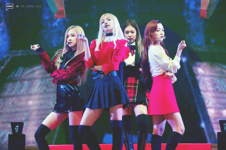 The idols of Blackpink pose during one of their concerts. The singers (from left to right: Rosé, Jennie, Lisa, and Jisoo) are often judged online for their appearance and weight. “These idols dont get to choose what they look like unless its their day off, which is rare,” freshman Gabrielle Short said.