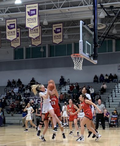 Lake Stevens girls played a dominating game against Kings High School. Senior Chloe Pattison, goes up for the shot, after rebounding the ball. The team made a total of 24 points in the 4th quarter. So were very hyped for even if its something small, junior Ella Edens said.