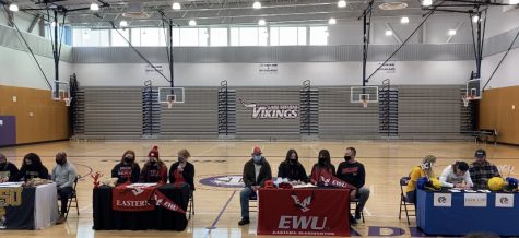 Time to shine: Seniors Baylor Thomas, Cordelia Wilcox, Tyler Fouts, and Camille Jentzsch sign their letters of intent to play college athletics. Fellow students, teachers, coaches, and family members sat in the stands as they supported the athletes. “Im glad I finally found a place that I could go to,” senior Jaden Cardona.