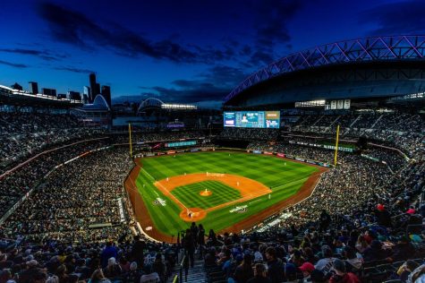 Seattle, Washington - April 15, 2022: The Ms are high favorites to win the AL West here in 2022 and fans across Washington are ready to celebrate a playoff birth here in the Pacific North-West. The defending AL Champs Houston Astros came to town on the Mariners home opener in front of a sold-out crowd at T-Mobile Park.  Being a Mariners fan lowkey sucks because they shouldve made the playoffs last year and now we have to wait a full 7 months to see them in the promise land, sophomore Zachary Rhodes said.