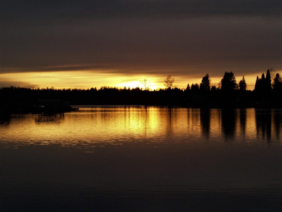 Sayonara sunshine: Early twilight looms as the sun sets over Lake Stevens. Seventeen days into Standard Time. A 4:23 PM sunset dashed hopes of safe evening recreation. Its safer if its lighter when it gets later in the day, junior Jack Santos said.