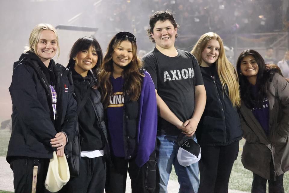 The full Lake Stevens athletic team pose for a picture before a football game: 
(Left-Right) Head Trainer Mariah Luedtke, junior Kayli Bravo, senior Citalin Lopez and juniors Cooper Rysemus, Hannah Avent and Caitlynn Ficke.