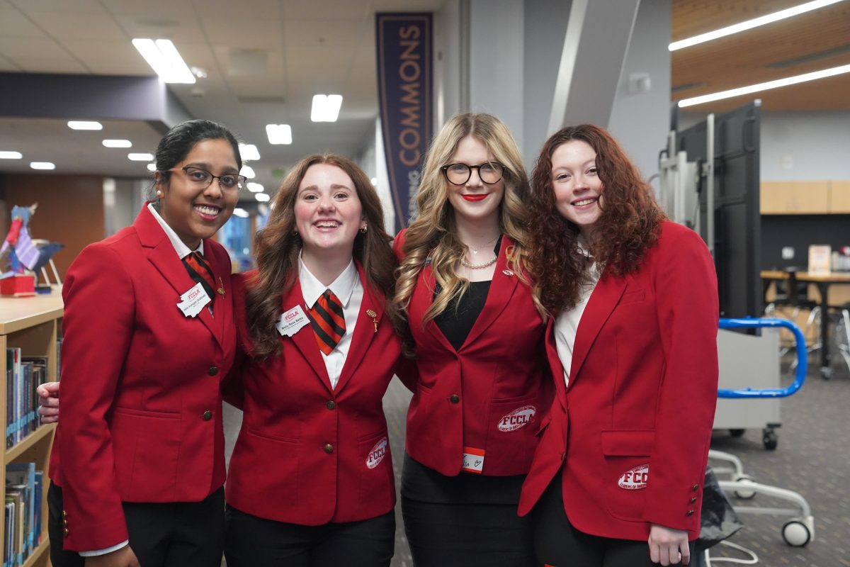 Seniors Harini Arumugam Gandhimathi, Molly Rose Bates, and Amelia Vasquez along with Zoey Martin from Lynnwood High School at the FCCLA Regional Competition.