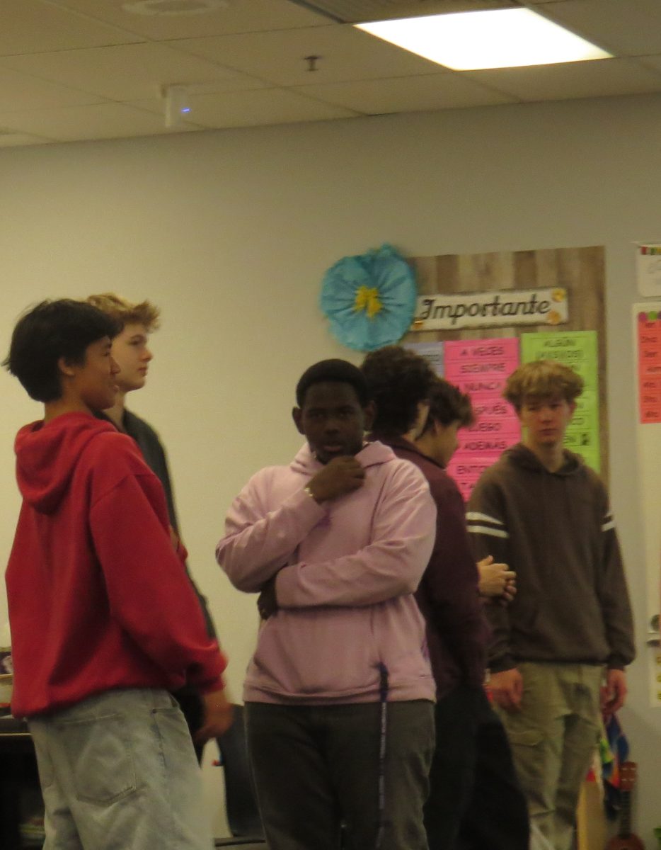 Sophomores Daustin Khounphixay, Kellen Johnson, junior Idris Thibou, sophomores Alec Ervig,  Rowen McClain, and Aidan Bringedahl participate in an activity during Maggie Gamero's fourth period Spanish 2 course.
