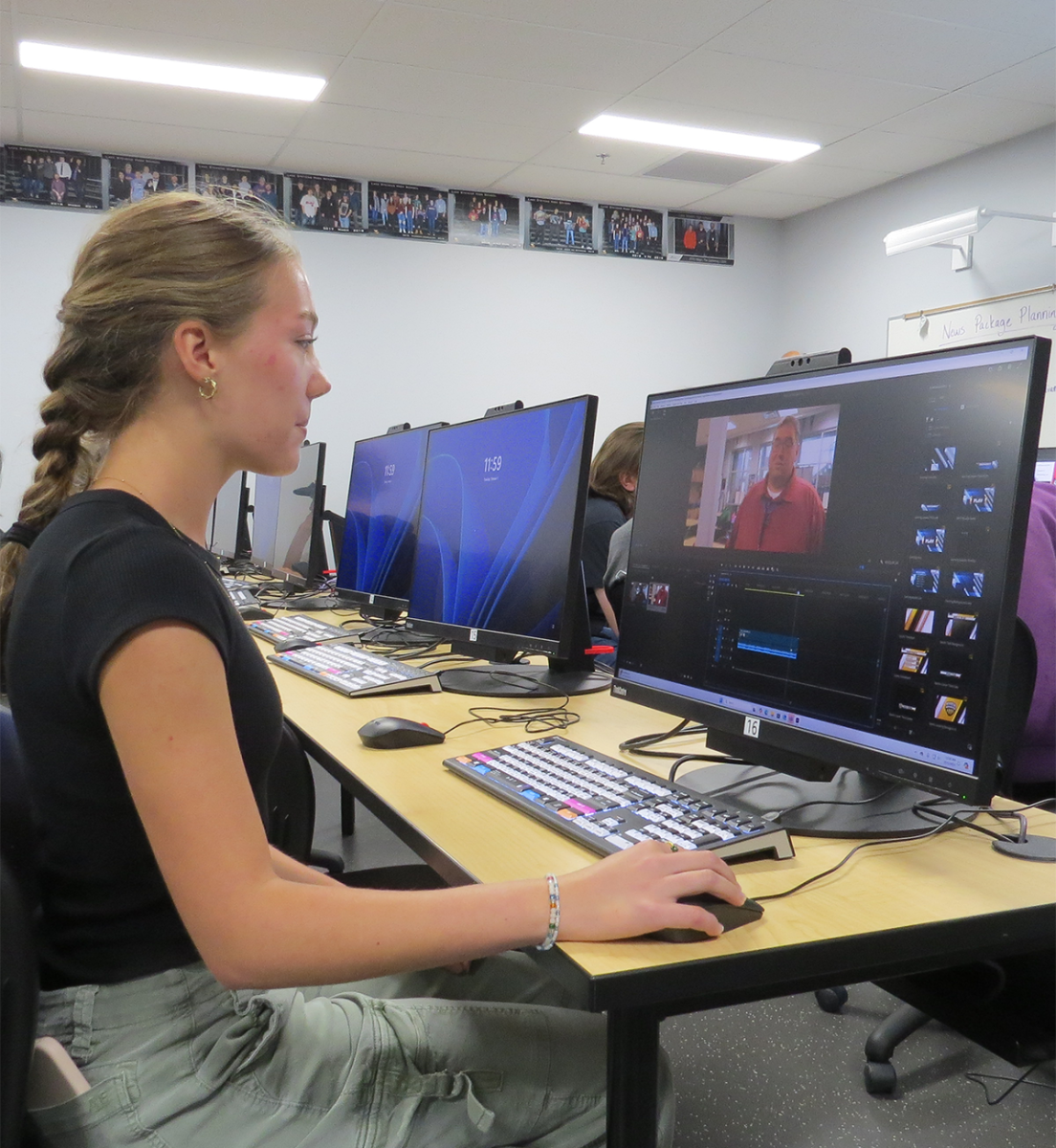 Reagan Rich, senior cross country runner, edits her video production project.