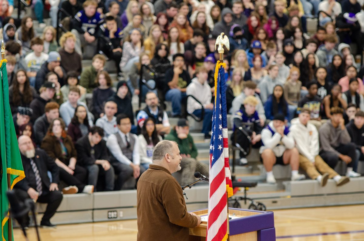 Veteran Mark Lovell addresses the student body during the Veterans Day assembly at Lake Stevens High School on Nov. 8, 2024.