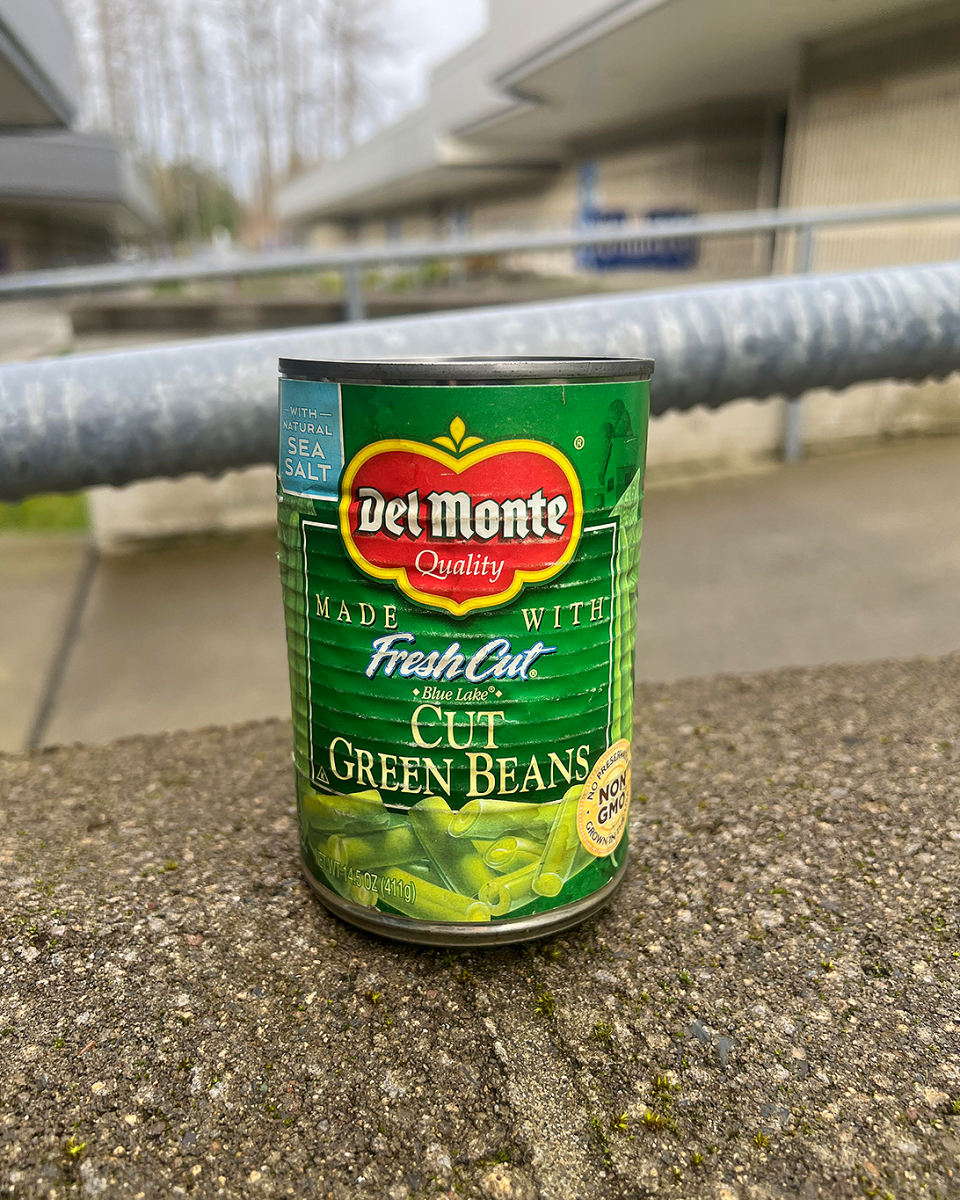 A can of beans is a traditional healthy item that people donate during a food drive.