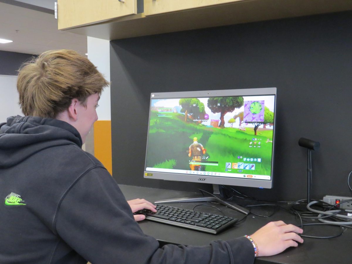 Sophomore Blake Young enjoys a game of OG Fortnite.