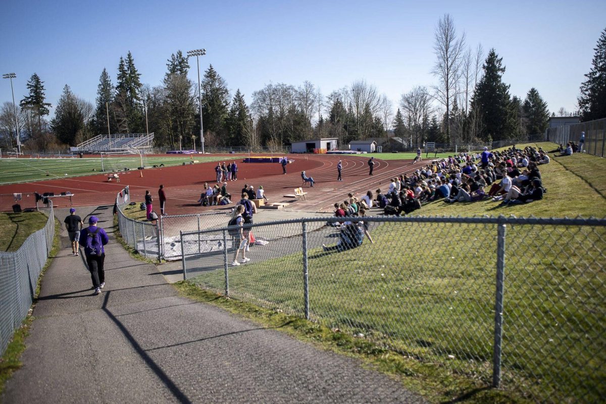 Lake Stevens Track and Field athletes group up for their daily meeting