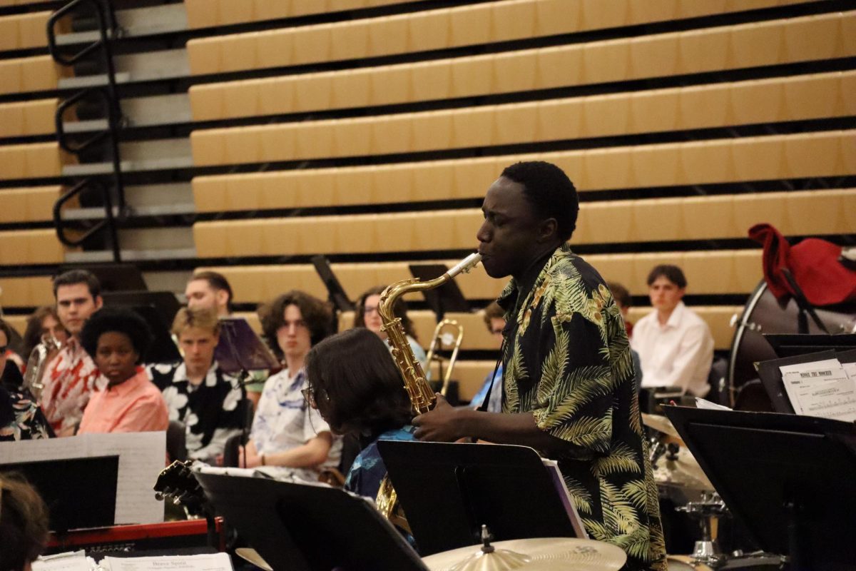 LSHS Jazz soloist Phineas Ruji performs during "Happy Go Lucky Local".