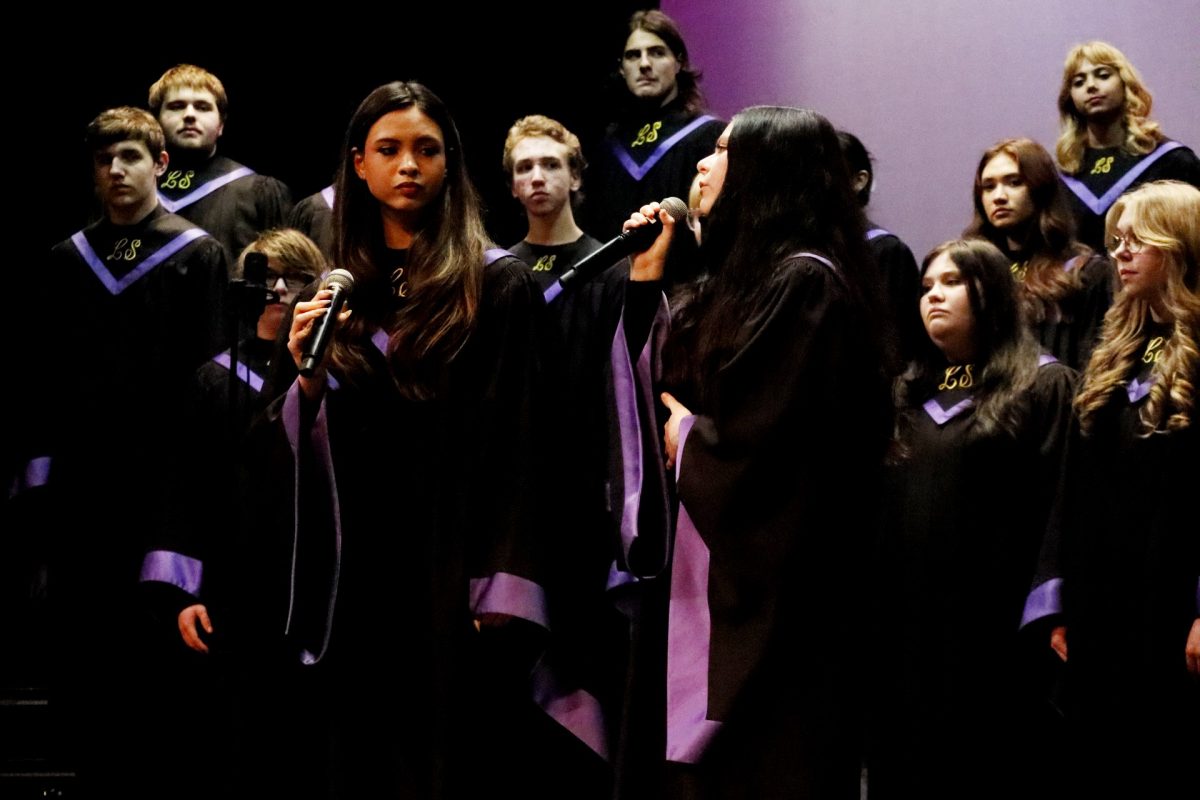 Sophomore Olivia Friedman and junior Sky Shehan harmonize during their duet.