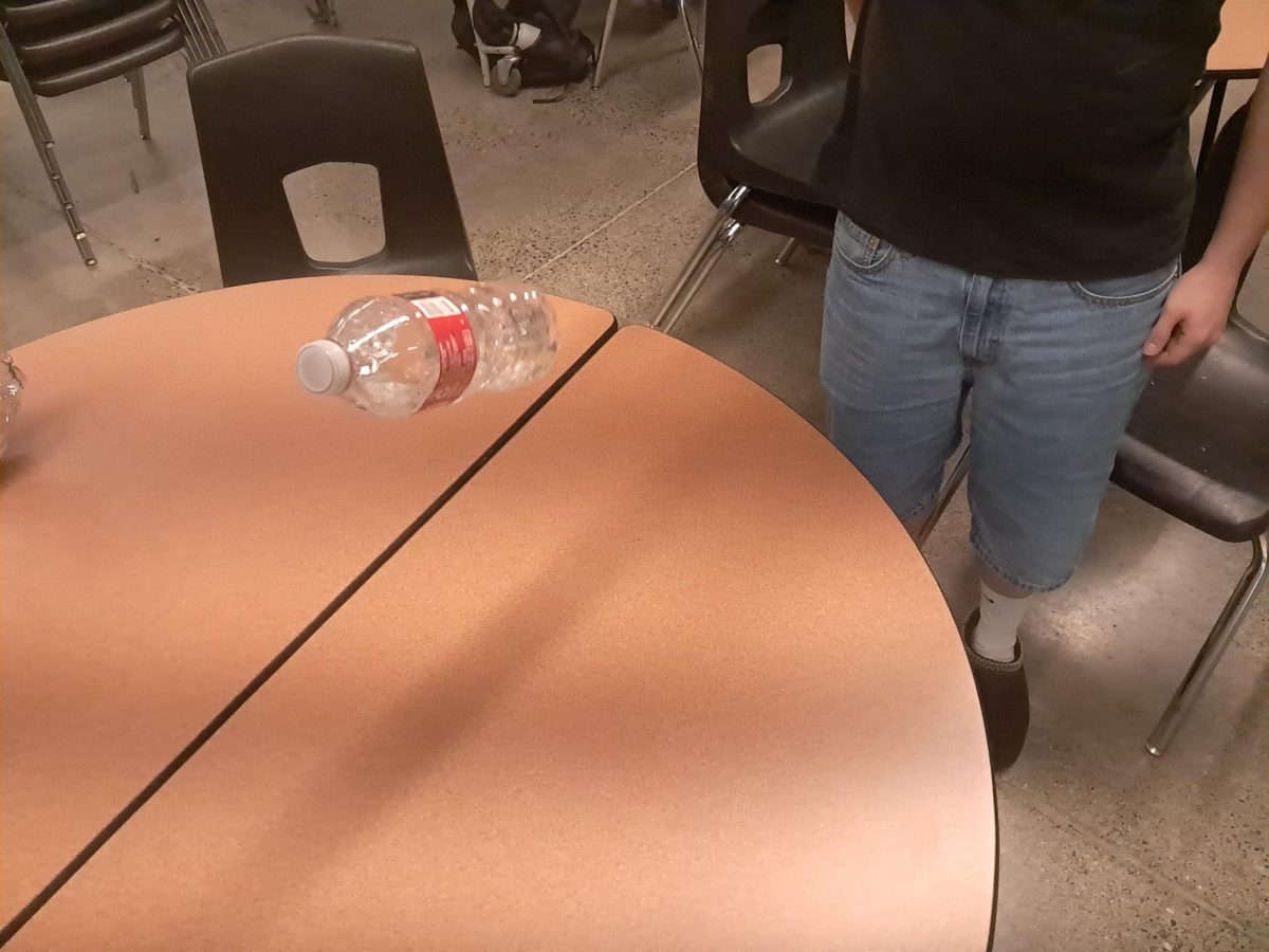 Senior Cole Dow does a Bottle flip which was a very popular trend back in 2016.