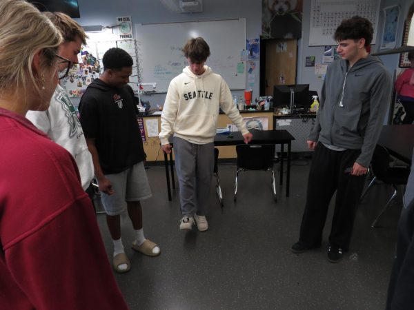 Chad Greaby stalls the Hacky Sack in class with finesse.