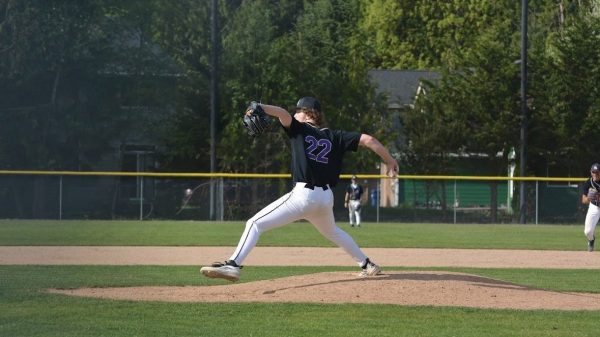 Senior Emmitt Linehan throws the first pitch against Arlington High School on May 1, 2026.