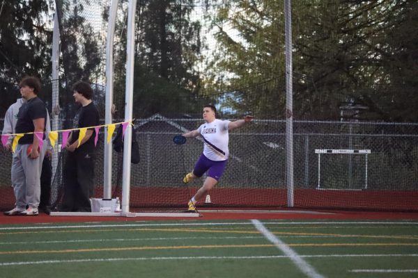 Senior Edward Kuhrau throws the discus against Kamiak on April 16.
