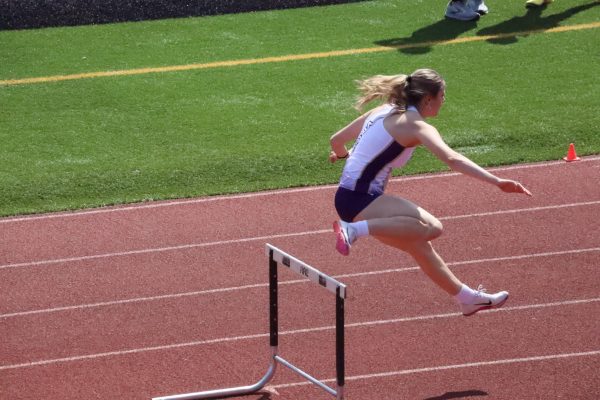Junior Kaetyn Riley runs the 300m hurdles at South Sound on May 2.